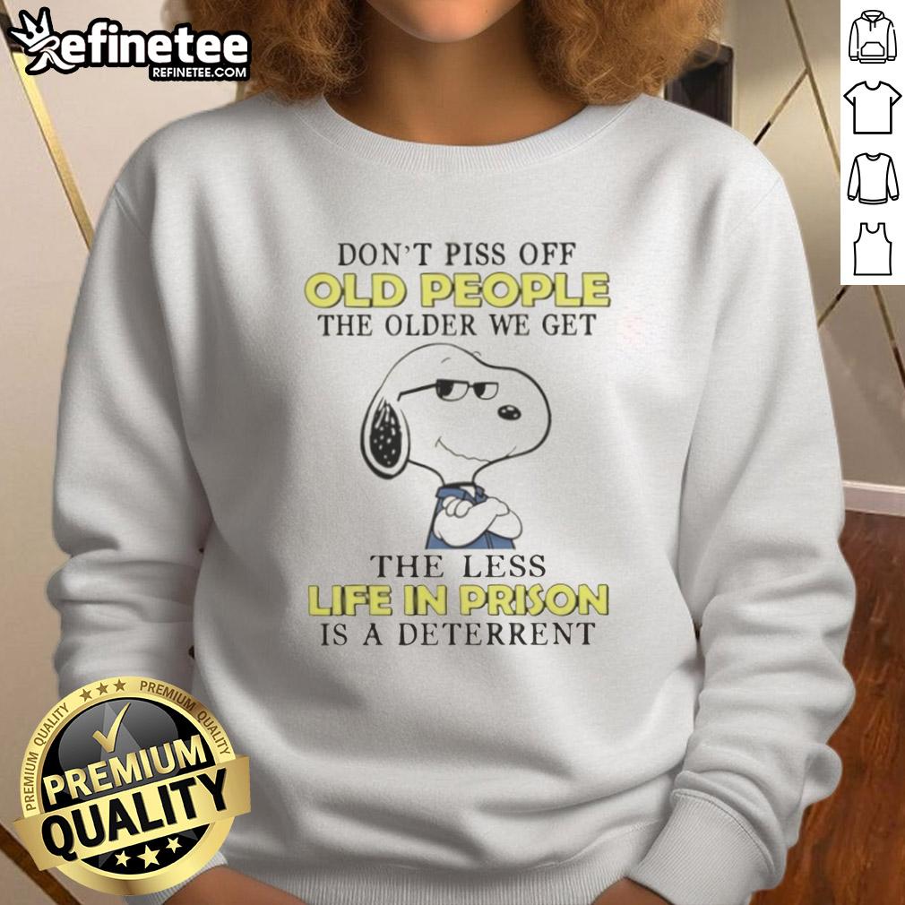 Alt Text: Original Snoopy sweatshirt with quote about aging and prison deterrence, featuring a playful design and vibrant colors.
