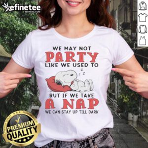 Alt Text: Original Snoopy 'We May Not Party Like We Used To' Ladies Tee featuring Snoopy taking a nap, perfect for casual wear.