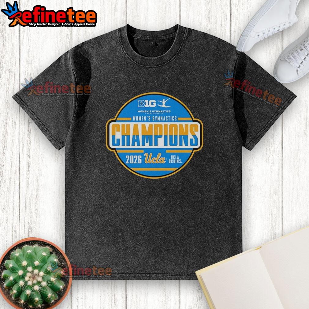 Alt Text: Premium UCLA Bruins Big Ten Women's Gymnastics Tournament Champions washed t-shirt displayed on a wooden background.