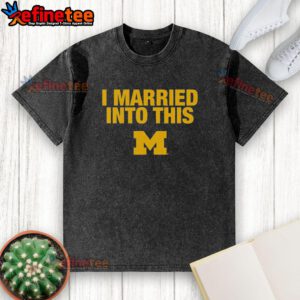 Alt Text: Official I Married Into This Michigan Wolverines Washed T-Shirt showcasing team pride in a stylish, comfortable design.