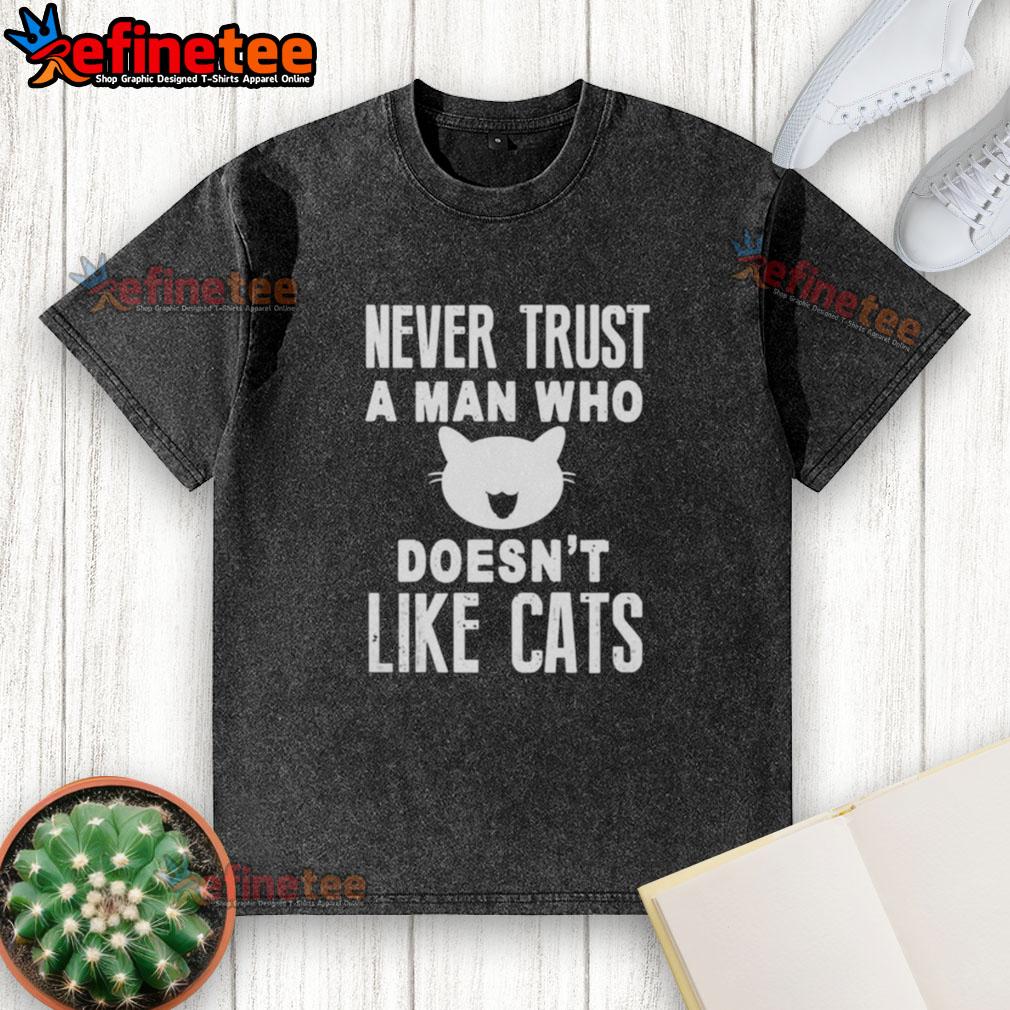 Official 'Never Trust A Man Who Doesn't Like Cats' washed t-shirt featuring a playful cat graphic and stylish design.