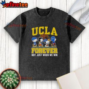 Alt Text: Top Peanuts x UCLA Bruins Forever Fan cartoon characters on a washed t-shirt, celebrating team spirit and loyalty.