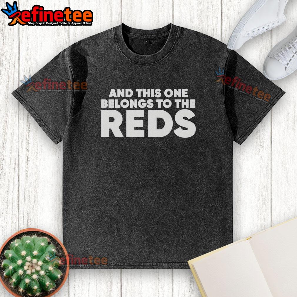 Ashley Davis wearing a 'This One Belongs To The Reds' washed t-shirt, showcasing casual style and team spirit.
