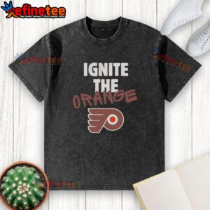 Official Philadelphia Flyers Ignite The Orange 2026 NHL Playoffs Fan Gear Washed T-Shirt featuring team colors and logo.