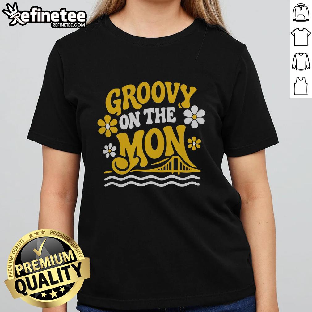 Alt Text: Official Pittsburgh Riverhounds SC Groovy On The Mon Ladies Tee featuring vibrant design and team logo.