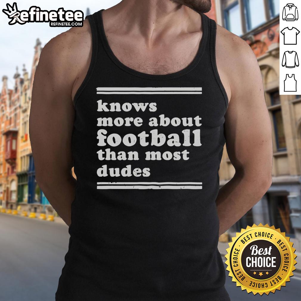 Stylish tank top with 'Knows More About Football Than Most Dudes' print, perfect for football fans and casual wear.