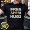 Official Free Mom Hugs Rainbow Heart Pride Movement Inclusive Love And Support t shirt displayed on a neutral background