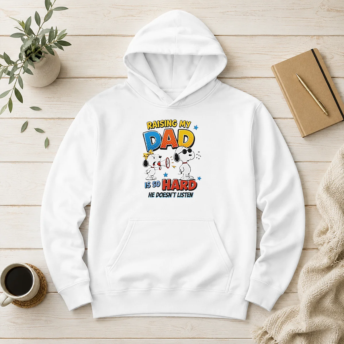 Premium Snoopy Belle Peanuts Raising My Dad Is So Hard He Does Not Listen Hoodie in black, featuring a cozy pullover design with front pocket