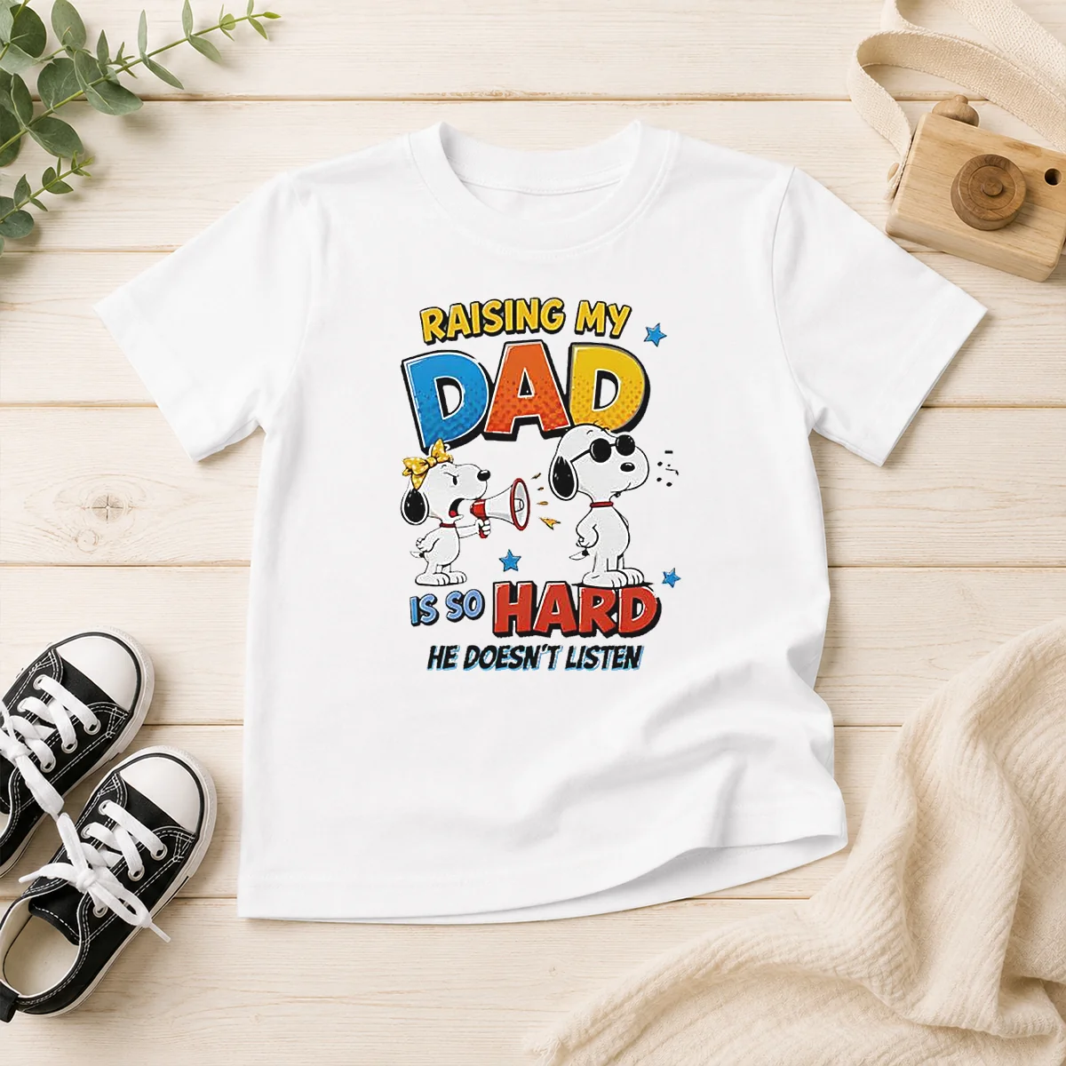 Premium Snoopy Belle Peanuts Raising My Dad Is So Hard He Does Not Listen kids t shirt in white, featuring a playful graphic design