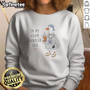 Pretty Goose Wearing Hoodie And Holding Remote Life'S A Garden In My Adam Sandler Era Funny sweatshirt displayed on a neutral background.