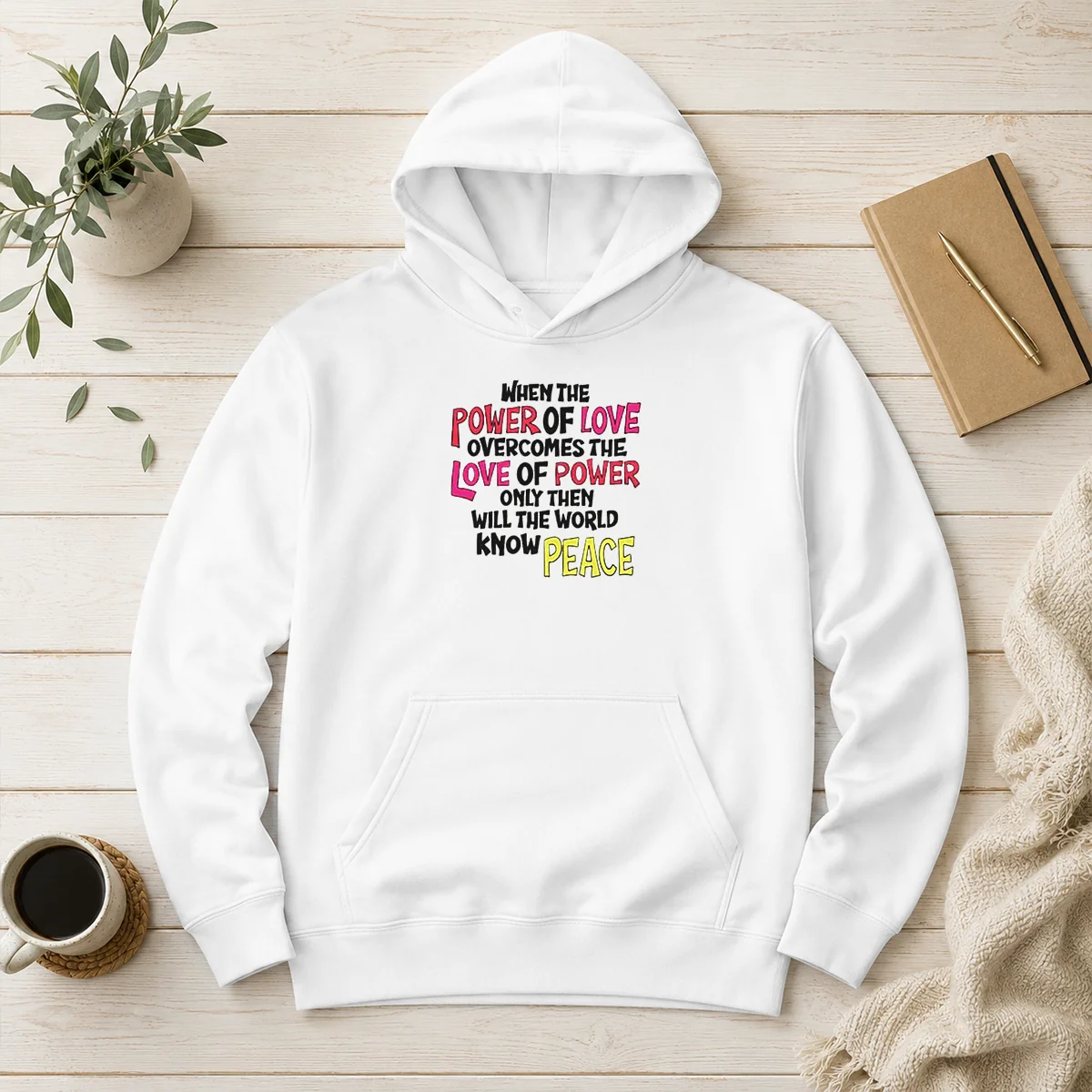 Official When The Power Of Love Overcomes The Love Of Power Hoodie in black, front view with kangaroo pocket and drawstring hood