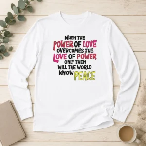 Official When The Power Of Love Overcomes The Love Of Power long sleeve shirt in black, displayed on a flat lay with clear front print