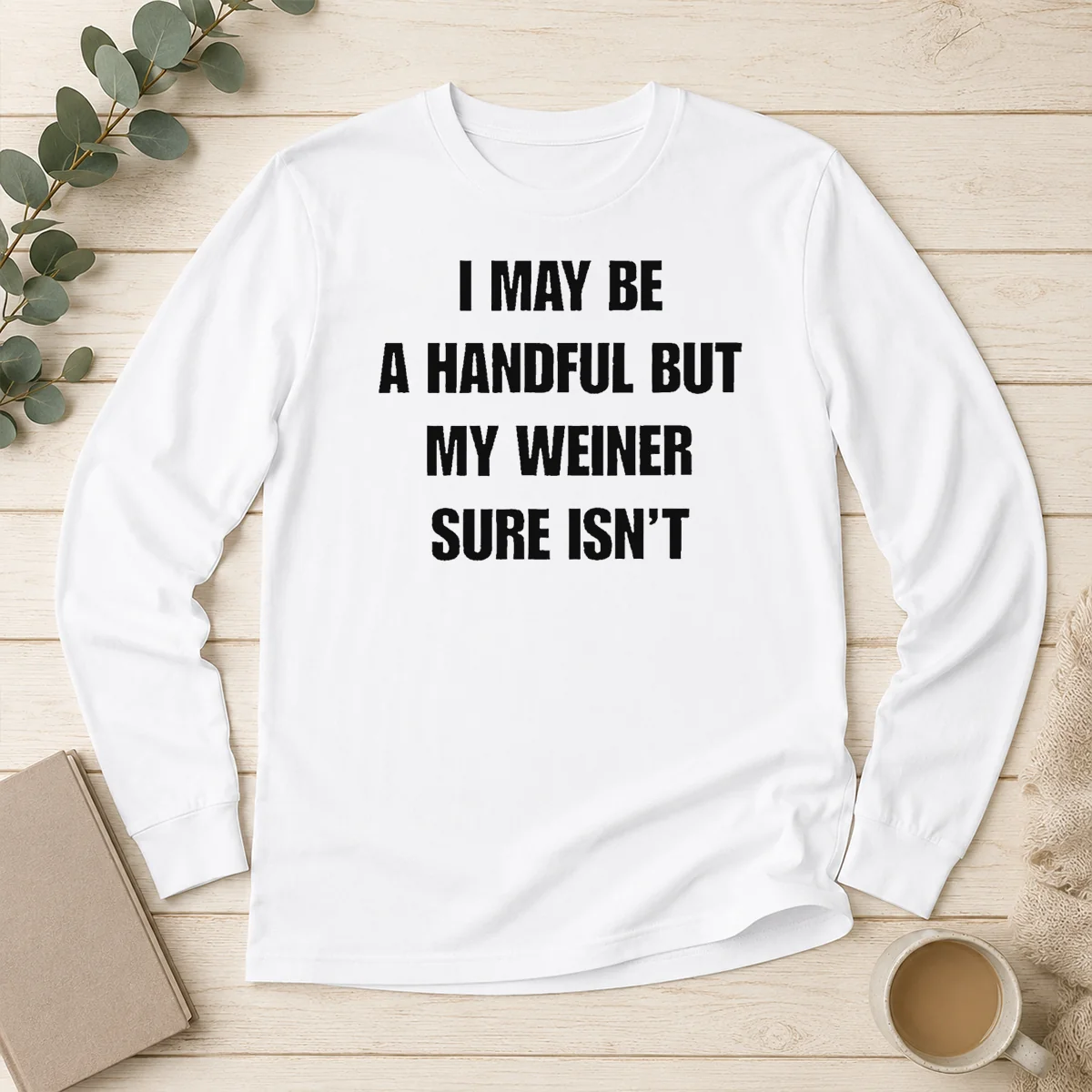 Top Pretty Sarcastic Adult Humor Handful But My Weiner Sure Isnt long sleeve shirt in dark color with bold white text design